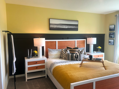 Vibrant Bedroom with Yellow Walls and Modern White Furniture